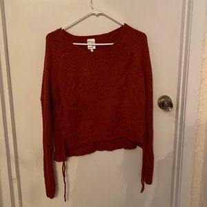 Dark orange sweater